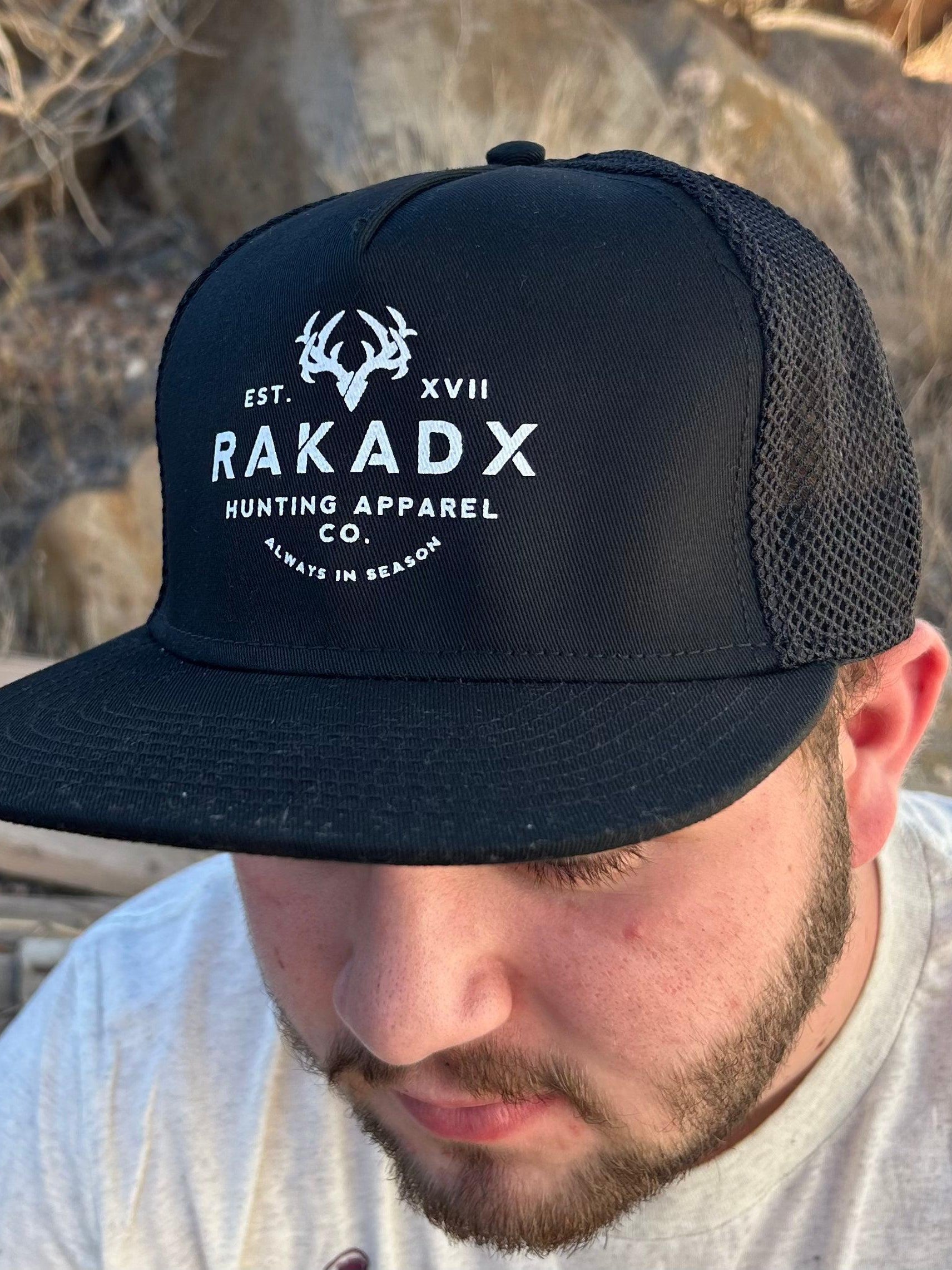 Dakota Flat Brim Trucker Hat at RakAdx